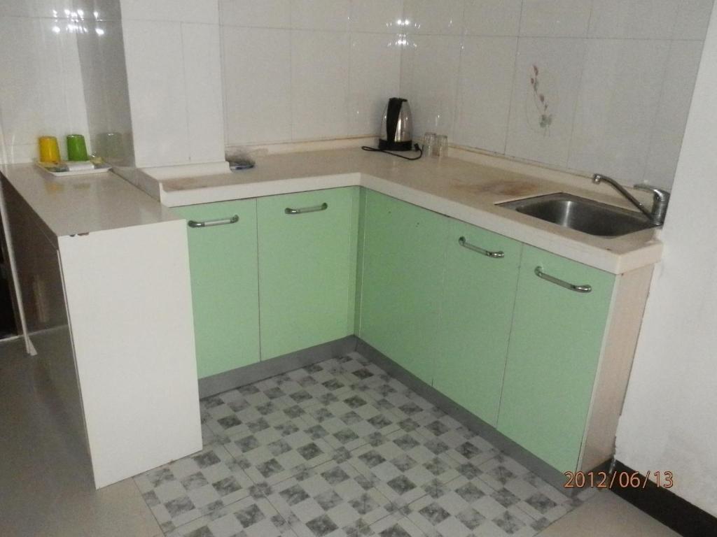 Xingfu Hotel Nanning Bagian luar foto