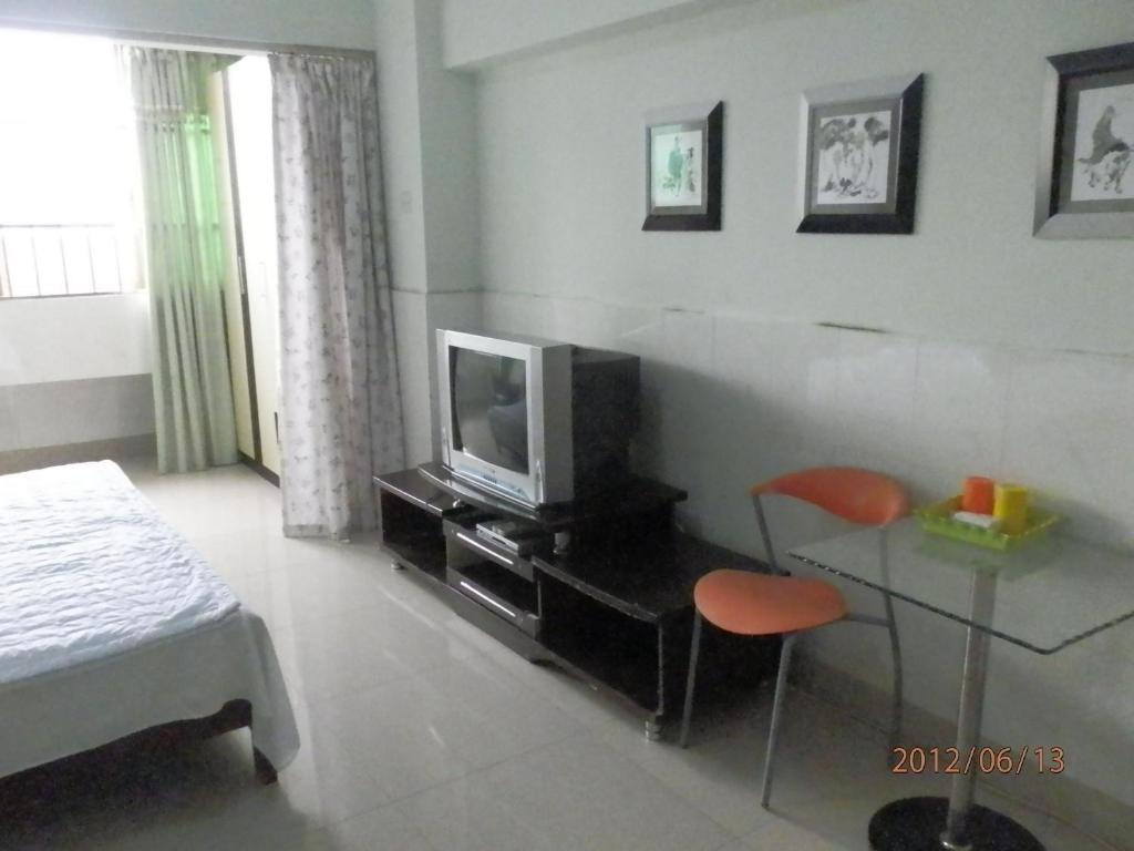 Xingfu Hotel Nanning Ruang foto