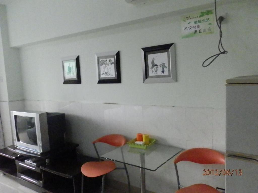 Xingfu Hotel Nanning Ruang foto