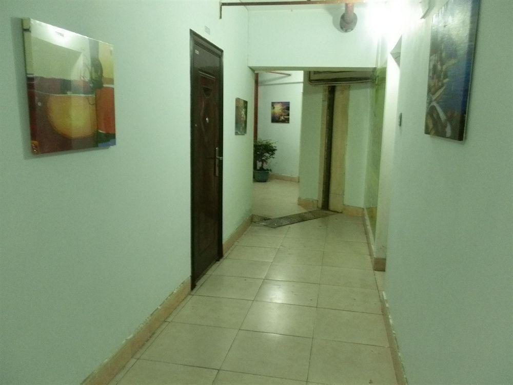 Xingfu Hotel Nanning Bagian luar foto
